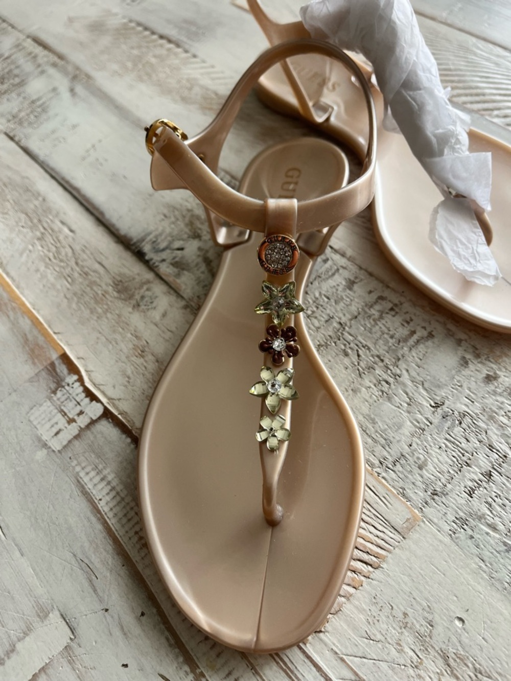 GUESS Nude Floral T-Strap Jelly Sandals with Gold Accents